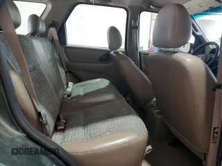 2002 Ford Escape XLS Value with VIN 1FMYU01B32KC48043, listed as a Copart auction lot 63011005 with 167,185 mi miles and Salvage title. Bid and sale history available at DreamBid. Image 11.