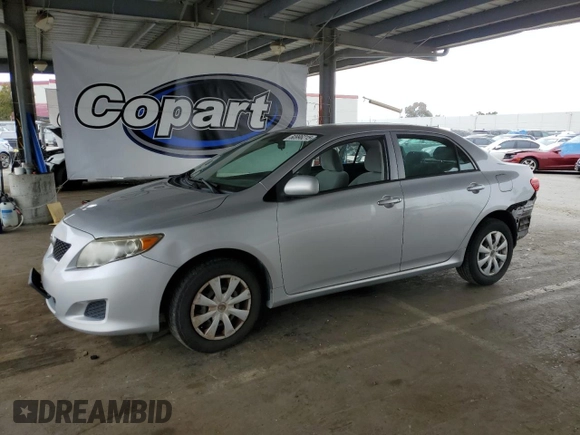 2010 Toyota Corolla with VIN 1NXBU4EE1AZ206765, listed as a Copart auction lot 60996215 with 196,623 mi miles and Salvage title. Bid and sale history available at DreamBid. Image 1.