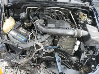 2015 Nissan Frontier SV z VIN 1N6AD0CW5FN734070, wystawiony jako Copart lot #89201045 z przebiegiem Nie podano mil oraz Szkoda całkowita • Salvage title. Historia ofert i sprzedaży dostępna na DreamBid. Obrazek 12.