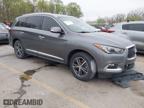 2019 Infiniti QX60 Pure z VIN 5N1DL0MN0KC516547, wystawiony jako IAAI lot #41947705 z przebiegiem 83 454 mil mil oraz . Historia ofert i sprzedaży dostępna na DreamBid. Obrazek 1.