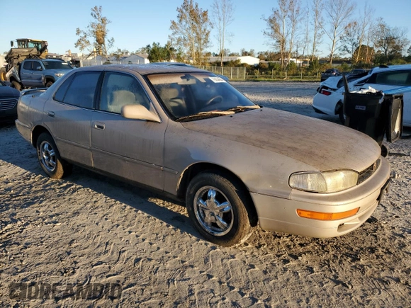 1992 Toyota Camry LE with VIN 4T1SK12E1NU127255, listed as a Copart auction lot 75554584 with 385,507 mi miles and Salvage Title. Bid and sale history available at carsss.com. Image 4.