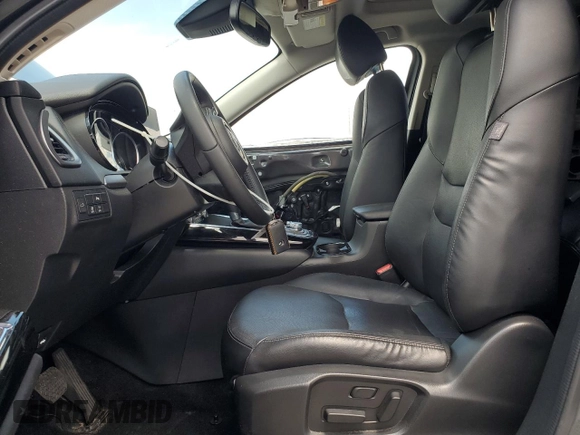 2020 Mazda CX-9 Touring с VIN JM3TCACY2L0414453, выставлен на аукционе Copart как лот 63451845 с пробегом 65 380 миль миль и Списание • Salvage title. История ставок и продаж доступна на DreamBid. Изображение 7.