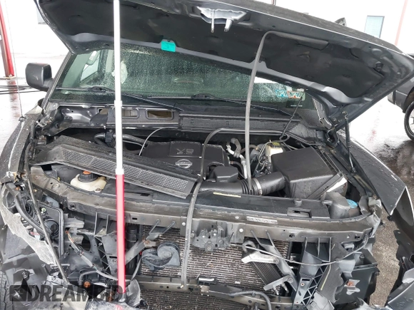 2014 Nissan Titan S with VIN 1N6AA0ECXEN504034, listed as a IAAI auction lot 39883492 with 189,529 mi miles and . Bid and sale history available at DreamBid. Image 10.