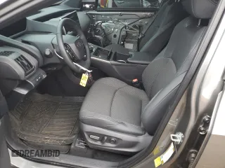 2024 Toyota bZ4X XLE z VIN JTMABACA8RA070121, wystawiony jako Copart lot #54550895 z przebiegiem 7312 mil mil oraz Szkody całkowita. Historia ofert i sprzedaży dostępna na DreamBid. Obrazek 7.