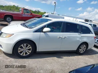 2014 Honda Odyssey EX-L with VIN 5FNRL5H69EB048867, listed as a IAAI auction lot 42190464 with 172,487 mi miles and . Bid and sale history available at carsss.com. Image 14.