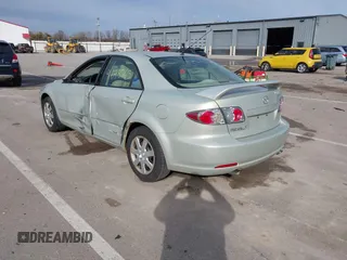 2006 Mazda 6 i with VIN 1YVFP80C665M21354, listed as a IAAI auction lot 41698565 with 155,313 mi miles. Bid and sale history available at carsss.com. Image 3.