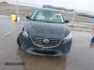 2016 Mazda CX-5 Grand Touring with VIN JM3KE4DY3G0769448, listed as a IAAI auction lot 41947725 with 154,051 mi miles and . Bid and sale history available at carsss.com. Image 19.
