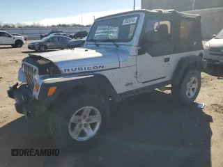 2003 Jeep Wrangler Rubicon z VIN 1J4FA69SX3P301962, wystawiony jako Copart lot #79928744 z przebiegiem Nie podano mil oraz Czysty tytuł • Clean title. Historia ofert i sprzedaży dostępna na DreamBid. Obrazek 1.