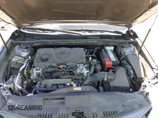 2019 Toyota Camry LE with VIN 4T1B11HK8KU289721, listed as a IAAI auction lot 42021107 with 69,828 mi miles and . Bid and sale history available at DreamBid. Image 10.