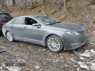 2015 Lincoln MKZ z VIN 3LN6L2J97FR616714, wystawiony jako IAAI lot #41664184 z przebiegiem 116 495 mil mil oraz . Historia ofert i sprzedaży dostępna na DreamBid. Obrazek 1.