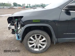 2014 Jeep Cherokee Limited with VIN 1C4PJMDS2EW120384, listed as a IAAI auction lot 42667778 with 121,206 mi miles and . Bid and sale history available at DreamBid. Image 19.