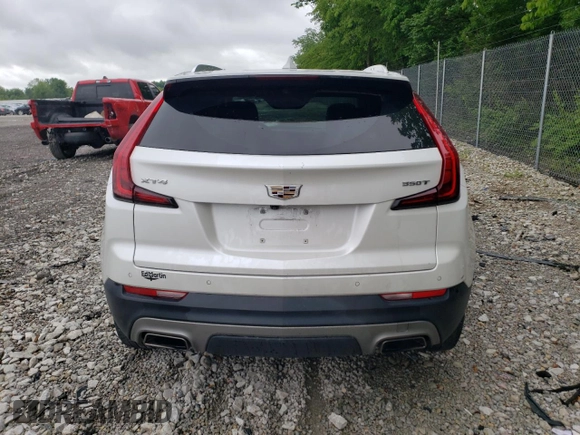 2021 Cadillac XT4 FWD Premium Luxury with VIN 1GYFZCR4XMF050649, listed as a Copart auction lot 58714445 with 33,233 mi miles and Non repairable. Bid and sale history available at DreamBid. Image 6.