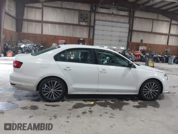 2015 Volkswagen Jetta SE z VIN 3VWD17AJ2FM427343, wystawiony jako IAAI lot #42520443 z przebiegiem 60 409 mil mil oraz . Historia ofert i sprzedaży dostępna na DreamBid. Obrazek 13.