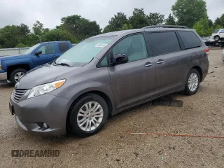 2014 Toyota Sienna XLE z VIN 5TDYK3DC7ES448016, wystawiony jako Copart lot #59035455 z przebiegiem 123 889 mil mil oraz Szkoda całkowita • Salvage title. Historia ofert i sprzedaży dostępna na DreamBid. Obrazek 1.