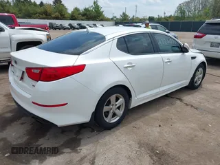 2015 Kia Optima LX z VIN KNAGM4A70F5649084, wystawiony jako IAAI lot #42231976 z przebiegiem 152 545 mil mil oraz . Historia ofert i sprzedaży dostępna na DreamBid. Obrazek 4.