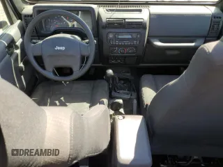 2006 Jeep Wrangler X with VIN 1J4FA39S66P717896, listed as a Copart auction lot 68147294 with 247,172 mi miles and Salvage Title. Bid and sale history available at carsss.com. Image 8.