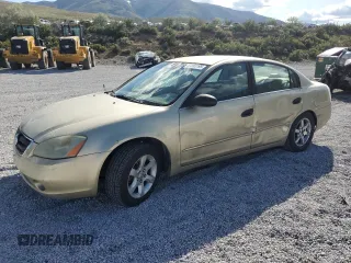 2002 Nissan Altima S with VIN 1N4AL11D32C109126, listed as a Copart auction lot 57283195 with 271,884 mi miles and Salvage title. Bid and sale history available at DreamBid. Image 1.