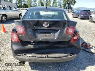 2010 Volkswagen Jetta S with VIN 3VWJZ7AJ1AM032185, listed as a Copart auction lot 58562615 with 189,752 mi miles and Salvage title. Bid and sale history available at DreamBid. Image 6.