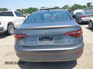 2021 Volkswagen Jetta S z VIN 3VWC57BU0MM098146, wystawiony jako IAAI lot #42201070 z przebiegiem 47 792 mil mil oraz . Historia ofert i sprzedaży dostępna na DreamBid. Obrazek 15.