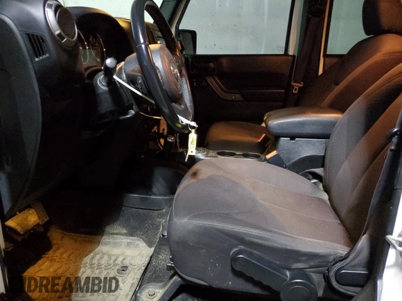 2017 Jeep Wrangler Unlimited Sport with VIN 1C4BJWDG1HL688424, listed as a Copart auction lot 51036035 with 130,499 mi miles and Salvage title. Bid and sale history available at DreamBid. Image 7.