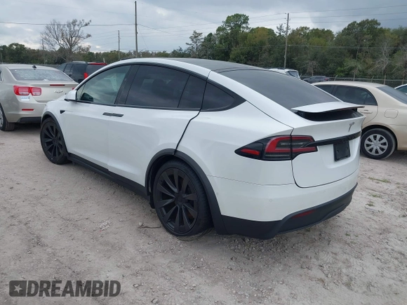 2022 Tesla Model X with VIN 7SAXCBE56NF364067, listed as a IAAI auction lot 40947378 with Not Provided miles and . Bid and sale history available at DreamBid. Image 3.