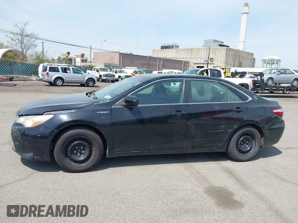 2015 Toyota Camry LE with VIN 4T1BD1FKXFU164963, listed as a IAAI auction lot 42132724 with 141,089 mi miles and . Bid and sale history available at DreamBid. Image 14.
