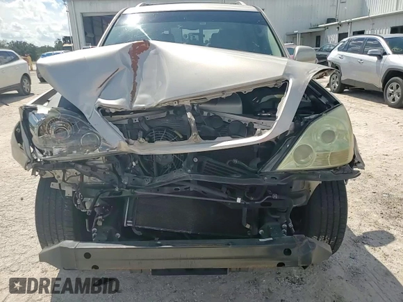 2004 Lexus GX 470 with VIN JTJBT20X340043730, listed as a Copart auction lot 73517824 with 203,606 mi miles and Salvage Title. Bid and sale history available at carsss.com. Image 12.