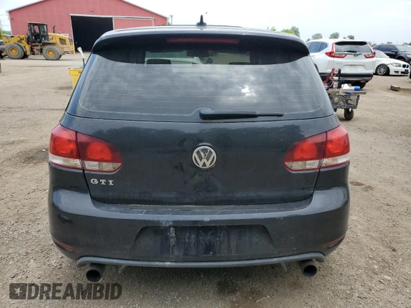 2010 Volkswagen Golf GTI with VIN WVWHV7AJ3AW392782, listed as a Copart auction lot 60820825 with 229,072 mi miles and Salvage title. Bid and sale history available at DreamBid. Image 6.