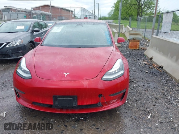 2018 Tesla Model 3 Long Range Battery with VIN 5YJ3E1EA6JF052659, listed as a IAAI auction lot 42093903 with 49,255 mi miles and . Bid and sale history available at DreamBid. Image 13.