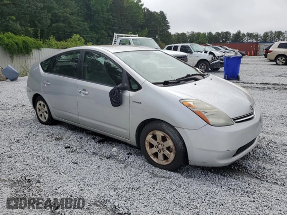 2007 Toyota Prius z VIN JTDKB20U377546391, wystawiony jako Copart lot #58447155 z przebiegiem 215 704 mil mil oraz Czysty tytuł • Clean title. Historia ofert i sprzedaży dostępna na DreamBid. Obrazek 4.