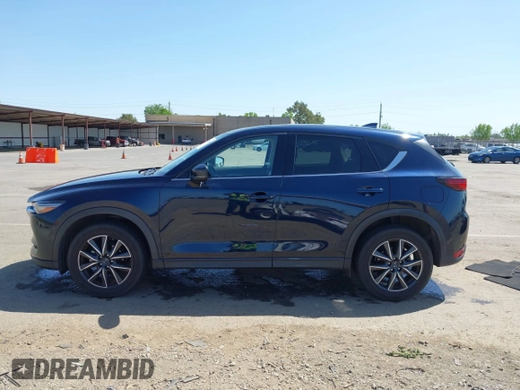 2018 Mazda CX-5 Grand Touring с VIN JM3KFBDM6J0326684, выставлен на аукционе IAAI как лот 42087646 с пробегом 111 192 миль миль и . История ставок и продаж доступна на DreamBid. Изображение 14.