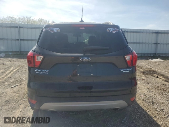 2019 Ford Escape Titanium with VIN 1FMCU0J99KUB10731, listed as a Copart auction lot 53433825 with 152,280 mi miles and Salvage title. Bid and sale history available at DreamBid. Image 6.