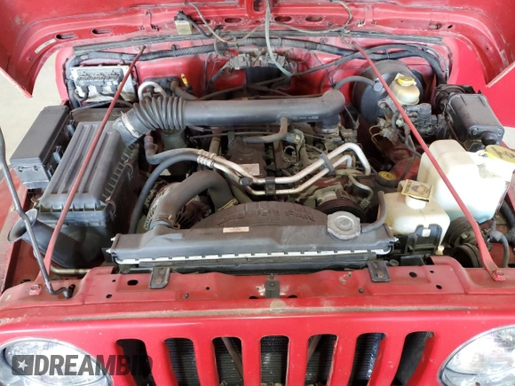 2000 Jeep Wrangler Sport with VIN 1J4FA49S9YP751596, listed as a Copart auction lot 52527315 with 132,514 mi miles and Clean Title. Bid and sale history available at carsss.com. Image 12.