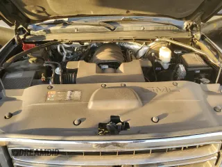 2015 GMC Yukon SLT with VIN 1GKS1BKC9FR144289, listed as a Copart auction lot 42179675 with 122,807 mi miles and Salvage Title. Bid and sale history available at carsss.com. Image 12.