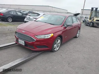2018 Ford Fusion Hybrid SE with VIN 3FA6P0LU0JR235235, listed as a IAAI auction lot 41885587 with 100,879 mi miles. Bid and sale history available at carsss.com. Image 18.