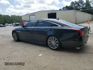 2015 Jaguar XJ с VIN SAJWJ1CD9F8V83885, выставлен на аукционе Copart как лот 58016335 с пробегом 81 794 миль миль и Чистый • Clean title. История ставок и продаж доступна на DreamBid. Изображение 2.