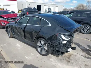 2025 BMW i4 xDrive40 z VIN WBY43HD03SFU60723, wystawiony jako IAAI lot #41934522 z przebiegiem 361 mil mil oraz . Historia ofert i sprzedaży dostępna na DreamBid. Obrazek 3.