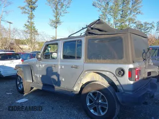 2018 Jeep Wrangler Unlimited Sport S z VIN 1C4HJXDG0JW158935, wystawiony jako IAAI lot #41187384 z przebiegiem 69 721 mil mil oraz . Historia ofert i sprzedaży dostępna na DreamBid. Obrazek 14.
