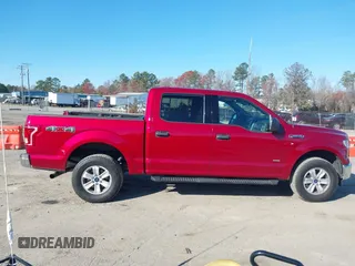 2015 Ford F-150 XLT with VIN 1FTEW1EP3FKF13367, listed as a IAAI auction lot 40994830 with 70,728 mi miles. Bid and sale history available at carsss.com. Image 14.