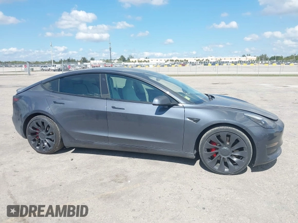 2022 Tesla Model 3 Performance with VIN 5YJ3E1EC9NF201184, listed as a IAAI auction lot 41534959 with 29,389 mi miles and . Bid and sale history available at DreamBid. Image 14.