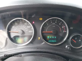 2014 Jeep Wrangler Unlimited Sahara с VIN 1C4BJWEG0EL248401, выставлен на аукционе IAAI как лот 42306970 с пробегом 134 904 миль миль и . История ставок и продаж доступна на DreamBid. Изображение 7.