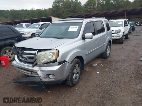 2011 Honda Pilot EX-L with VIN 5FNYF3H6XBB036391, listed as a IAAI auction lot 41100998 with 120,516 mi miles and . Bid and sale history available at DreamBid. Image 2.