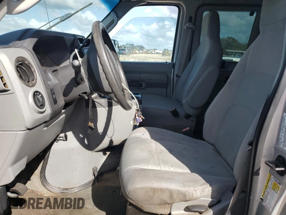 2011 Ford Econoline Passenger XL with VIN 1FBNE3BL4BDB03535, listed as a Copart auction lot 77243284 with Not Provided miles and Non Repairable. Bid and sale history available at DreamBid. Image 7.