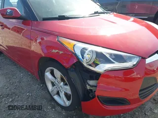 2013 Hyundai Veloster w/Gray Int with VIN KMHTC6AD8DU112810, listed as a IAAI auction lot 42144625 with 142,524 mi miles and . Bid and sale history available at DreamBid. Image 6.