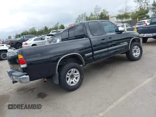 2001 Toyota Tundra SR5 with VIN 5TBRT34181S197753, listed as a IAAI auction lot 42064862 with 261,523 mi miles. Bid and sale history available at carsss.com. Image 4.