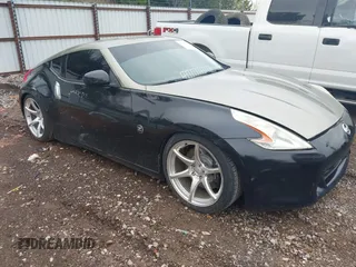 2009 Nissan 370Z Touring with VIN JN1AZ44E69M404341, listed as a IAAI auction lot 41907551 with 144,612 mi miles and . Bid and sale history available at DreamBid. Image 1.
