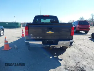 2014 Chevrolet Silverado 1500 LT with VIN 1GCVKREC0EZ377177, listed as a IAAI auction lot 41683600 with 148,672 mi miles and . Bid and sale history available at DreamBid. Image 16.