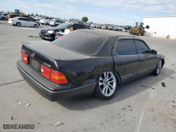 1999 Lexus LS 400 Luxury Sdn with VIN JT8BH28F7X0141873, listed as a Copart auction lot 77898024 with 235,914 mi miles and Salvage Title. Bid and sale history available at carsss.com. Image 3.