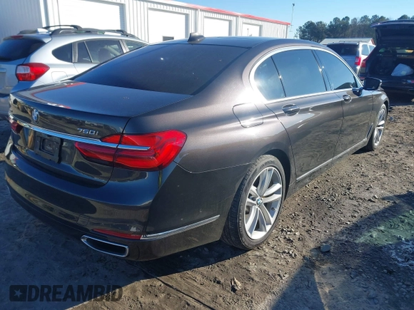 2017 BMW 7 Series ALPINA B7 xDrive with VIN WBA7F2C52HG422187, listed as a IAAI auction lot 41319169 with 114,883 mi miles. Bid and sale history available at carsss.com. Image 4.
