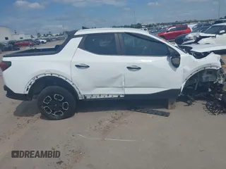 2022 Hyundai Santa Cruz SEL z VIN 5NTJBDAE5NH007005, wystawiony jako IAAI lot #42058065 z przebiegiem 30 825 mil mil oraz . Historia ofert i sprzedaży dostępna na DreamBid. Obrazek 14.